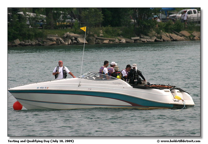 Rescue boat and divers, waiting and watching